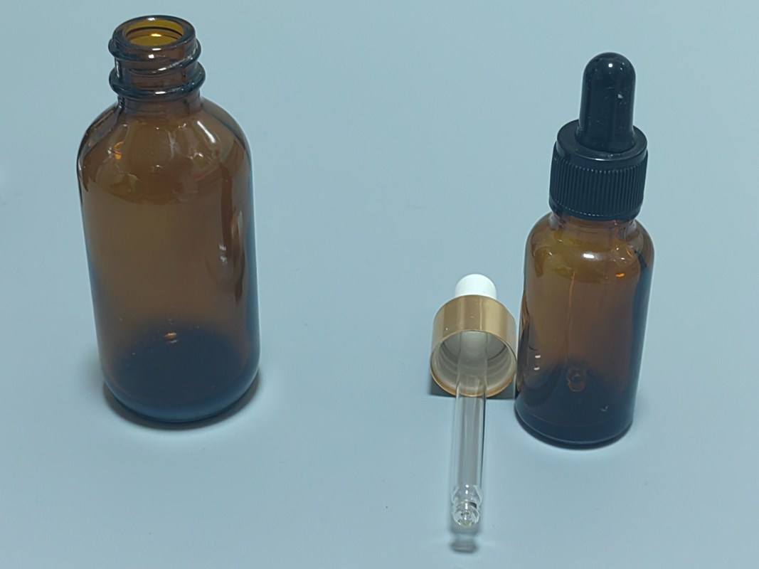 Opakowanie oleju eterycznego 1OZ 2OZ 20ml 30ml 50ml surowiec z oleju eterycznego bursztynowego Szklana butelka kroplówkowa z dziecięco zabezpieczoną czapką